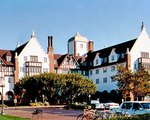 Exterior view of Montauk Manor alongside a pathway .