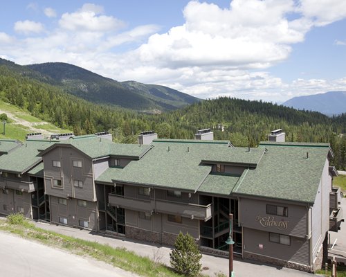 An exterior view of The Edelweiss resort alongside the mountain.