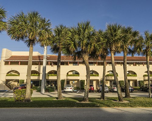 Scenic exterior view of the Costa del Sol Resort with parking area.