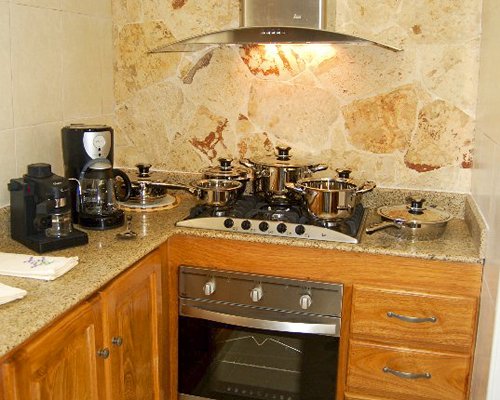 A well equipped kitchen with a stove.