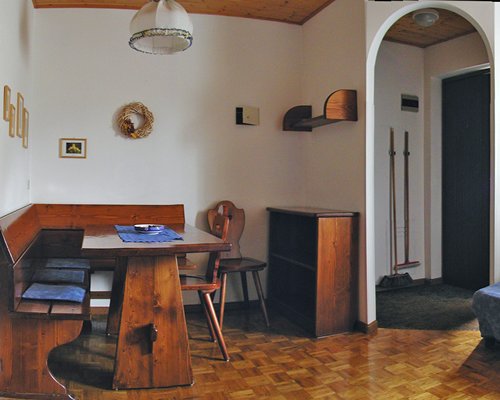 Furnished living room with dining area.