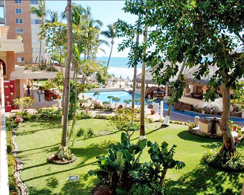Balcony view of an outdoor swimming pool.