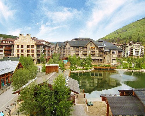 Scenic exterior view of the Village Square At Copper Mountain Resort alongside the waterfront.