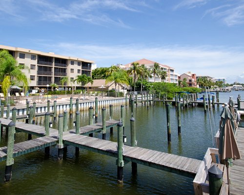 An exterior view of a dock alongside resort units.