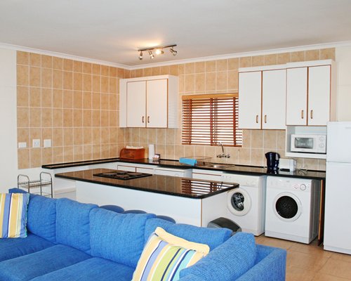 Living room with an open plan kitchen.