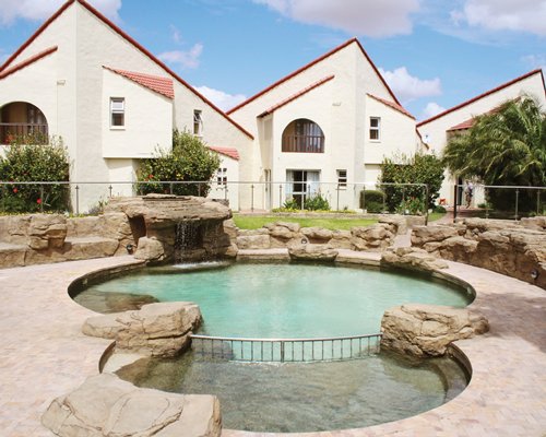 An outdoor pool alongside the Port Owen Marina resort.