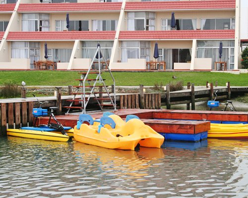 A view of marina alongside multi story resort units.
