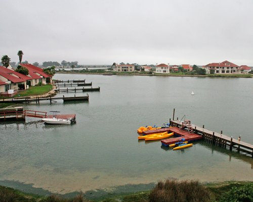 A view of the wooden pier and marina alongside the resort.