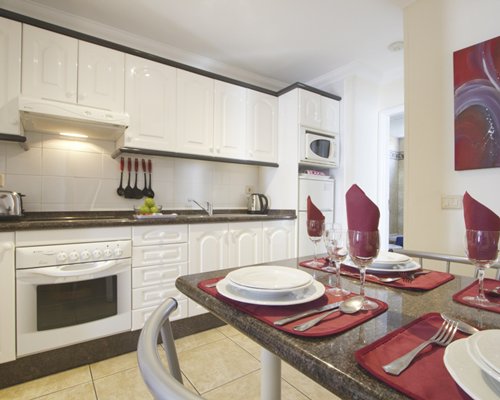 An open plan kitchen and dining area.