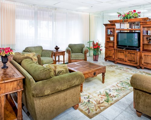 A well furnished living room with television.