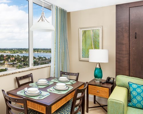 An open plan living and dining area with an outside view.