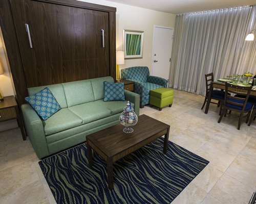 A well furnished living room and dining area.