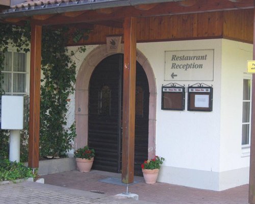 Exterior view of an entrance to reception and restaurant.