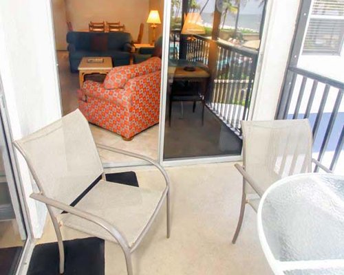 A balcony with patio furniture.