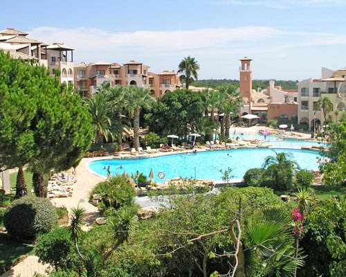 Exterior view of Four Seasons Vilamoura with outdoor swimming pool.