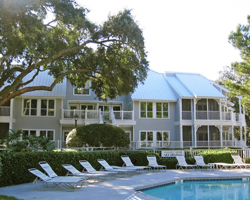 An outdoor swimming pool alongside the resort.