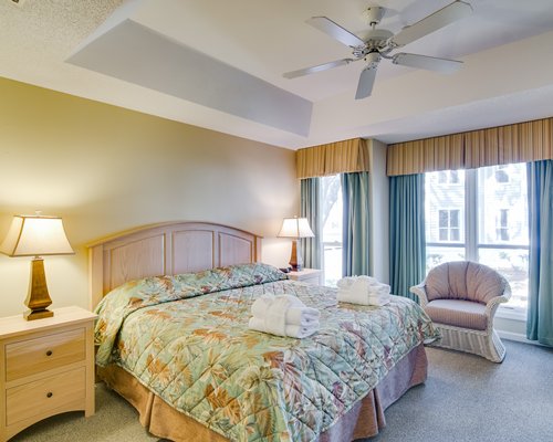 A well furnished bedroom with a two beds.