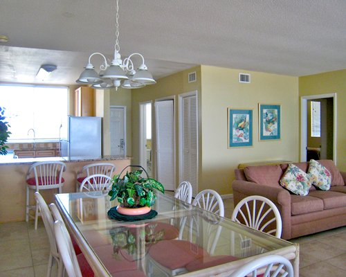 An open plan living and dining area alongside the kitchen with a breakfast bar.