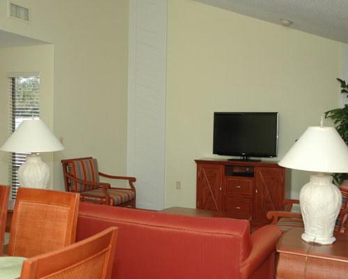 A well furnished living room with television.