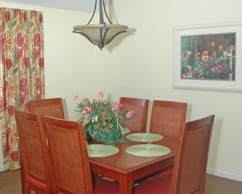 A view of the wooden dining table.