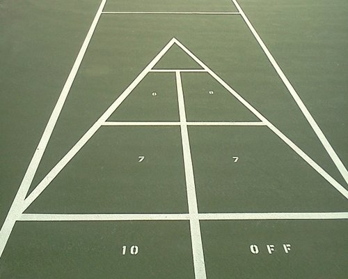Outdoor recreation area with shuffle board.