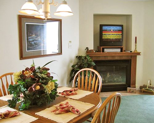 Living room with dining area and fireplace.