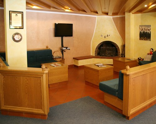 Indoor lounge area with a television.