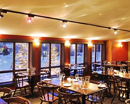 An indoor fine dining area of the Chalets la Falaise resort.