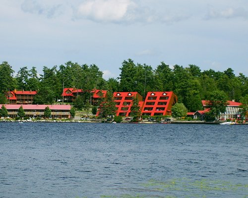 A view of multi story resort units from a waterfront.