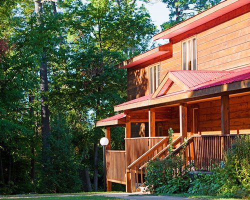 Exterior view of Calabogie Lodge Resort surrounded by trees.