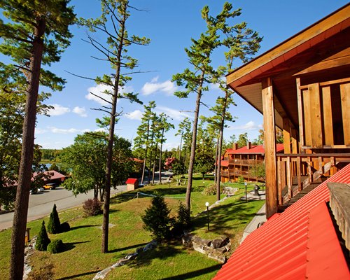 Scenic pathway with parking lot alongside multiple unit balconies.