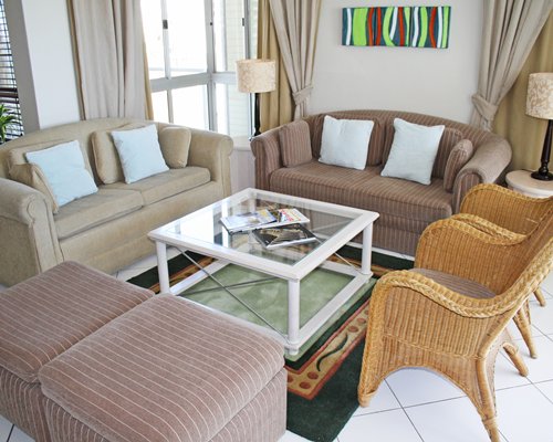 A well furnished living room with a double pull out sofa.
