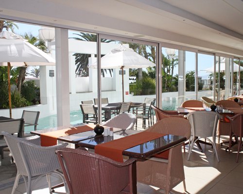 Indoor restaurant with outside view.