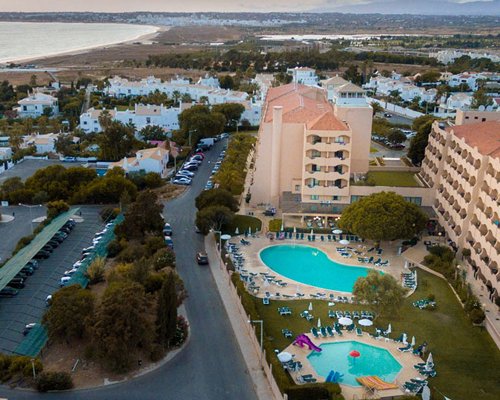 An aerial view of the resort property with a swimming pool.