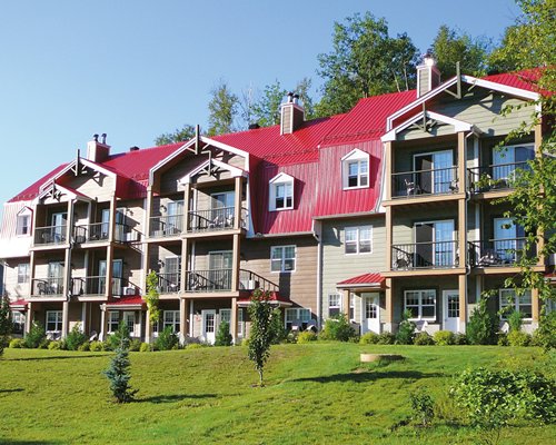 Scenic exterior view of multiple unit balconies.