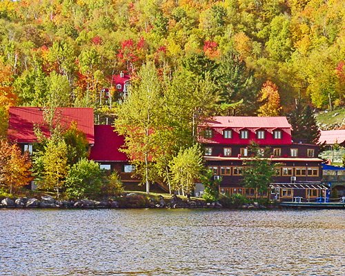 Scenic exterior view of multi story resort units facing the lake.