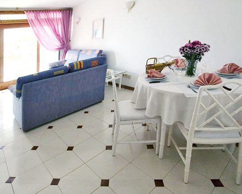 An open plan living and dining area with an outside view.