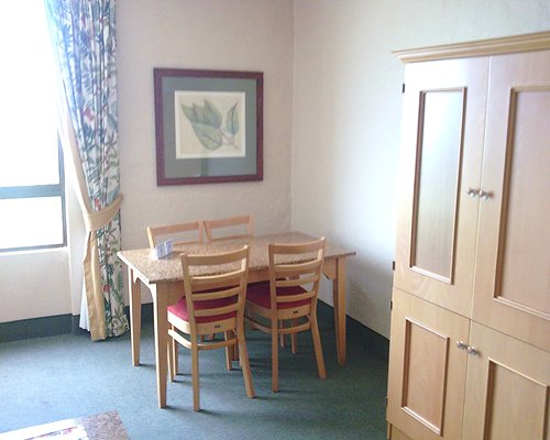 A well furnished dining area with an outside view.