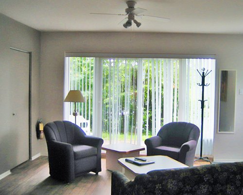 A well furnished living room with outside view.