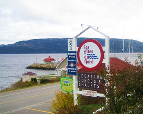 A signboard alongside a road leading to the Chalets Sur Le Fjord resort.