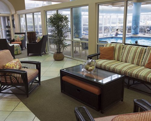 A well furnished lounge area with an outdoor view.