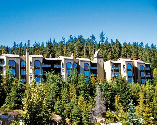 An exterior view of the Ironwood resort surrounded by wooded area.