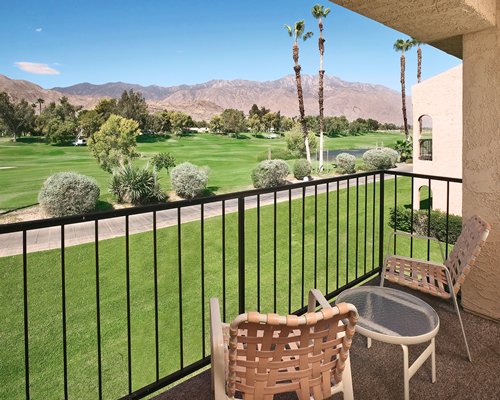 Balcony with patio furniture with the scenic landscape.