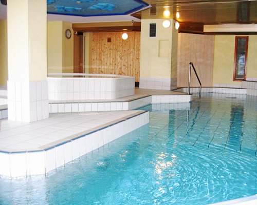 A large indoor swimming pool.