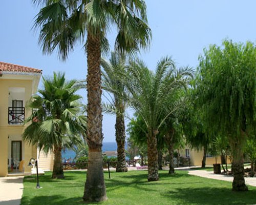 An exterior view of the resort units alongside the beach.