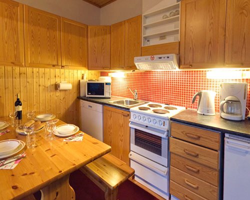 An open plan kitchen and dining area.