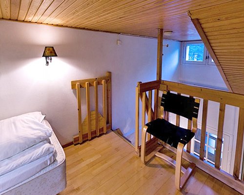 A stairway leading to bedroom.