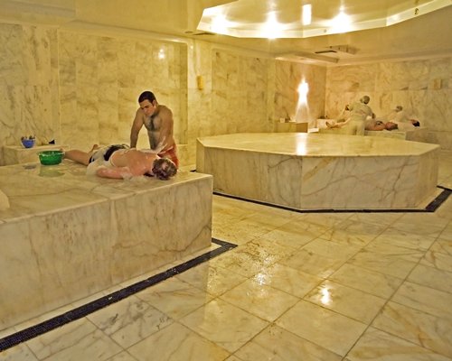 A well furnished indoor spa room.