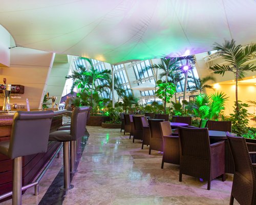Indoor bar and restaurant at Golden Shores & Crown Paradise Club.