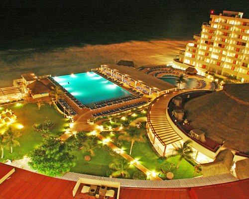 An aerial view of Golden Shores & Crown Paradise Club with outdoor swimming pool alongside.